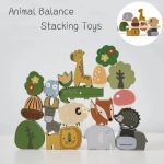 Empilez des animaux en bois colorés pour le jeu éducatif