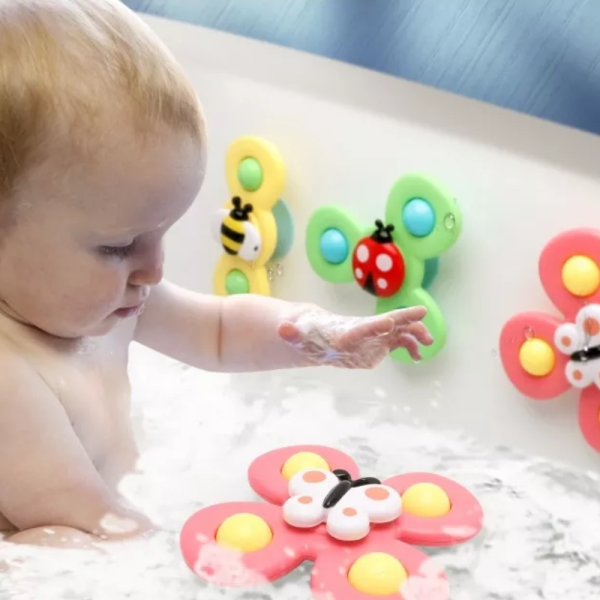 Accessoire de bain tournant pour divertir les enfants à l'heure du bain