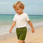 Short d'été pour enfants, motif amusant de dinosaure