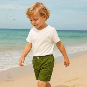Short d'été pour enfants, motif amusant de dinosaure