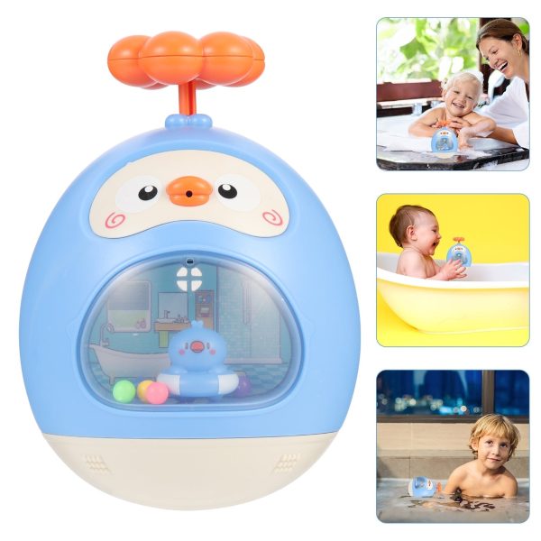 Bain joyeux avec le canard pulvérisateur