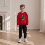 Chaud et douillet, pull rouge pour les vacances d'hiver