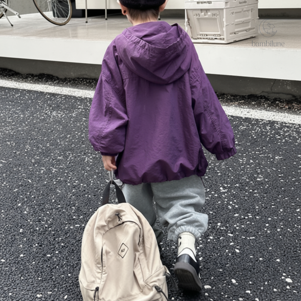 Veste enfant résistante à l'eau avec capuche ajustable
