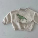 Pull mignon pour enfants, thème dinosaure ludique