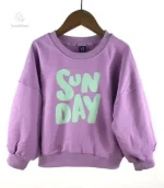Pull coloré à imprimé amusant pour les jeunes fashionistas