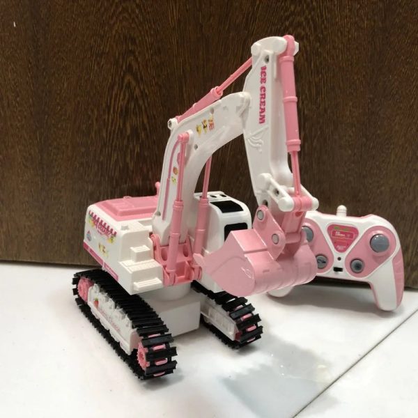 Fête de creusage avec l'excavatrice télécommandée rose