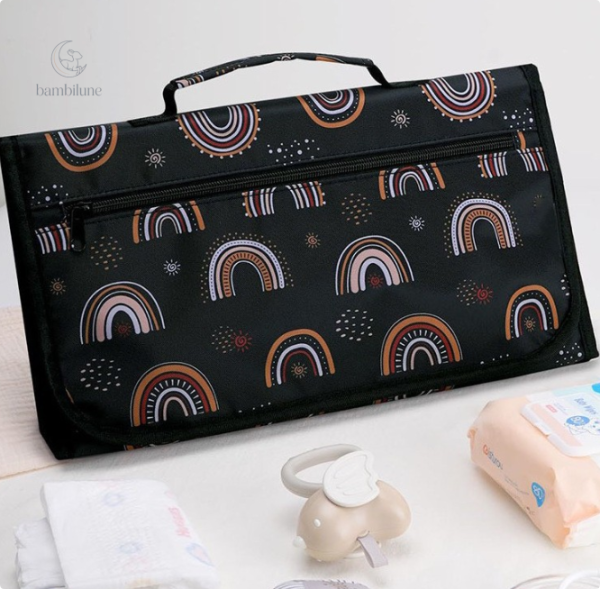 QuickChange – Tapis à langer au style moderne et fonctionnel