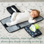 QuickChange – Tapis à langer souple pour un changement rapide