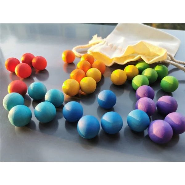 Boules en bois multicolores, parfaites pour l'éveil des tout-petits