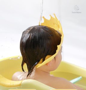 Bonnet de bain confortable pour un bain sans pleurs