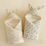 Couverture d'emmaillotage pour un hiver douillet