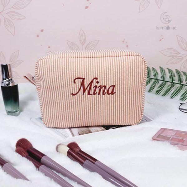 Trousse à maquillage rayée et stylée