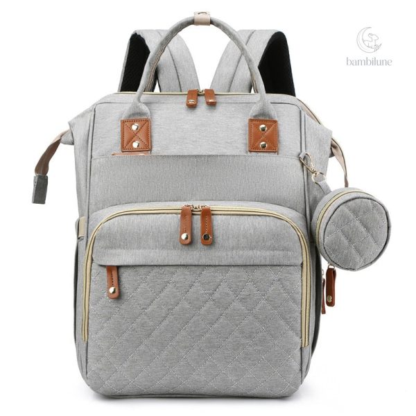 Sac à langer pratique et lit de voyage en un