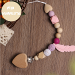 Collier de sucette en bois naturel, design ludique