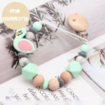 Accessoire tendance en bois pour la sucette de bébé